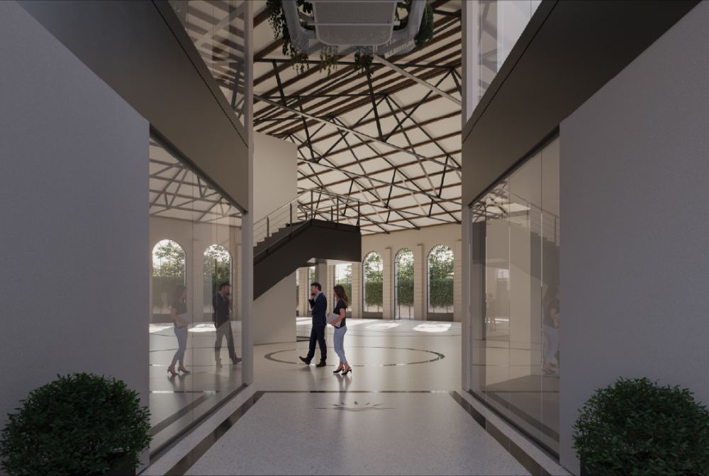 Hall interior con escalera, cabreadas y ventanales en arco